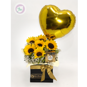 Regala una hermosa caja de lujo con girasoles, globo y chocolate. 